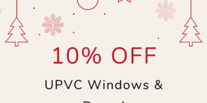 A festive ad offering 10% off on UPVC windows & doors with hanging Christmas decorations.